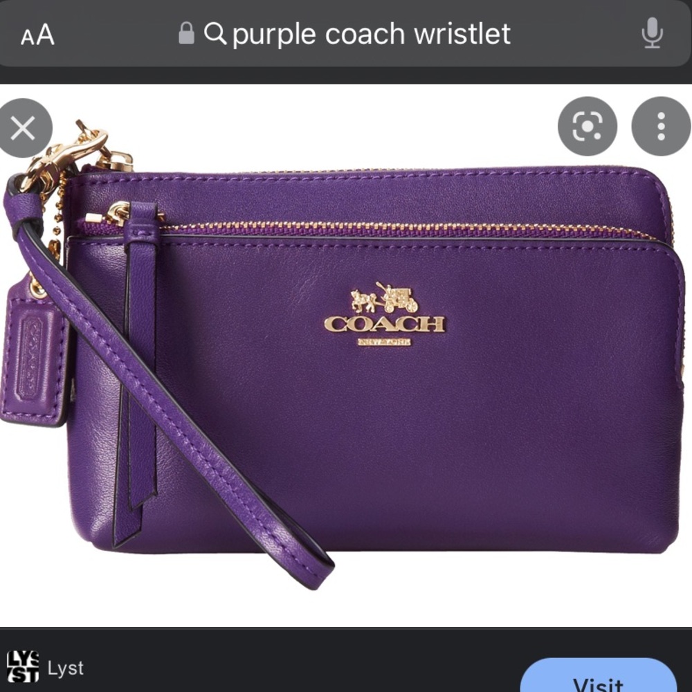 Coach purple wristlet wallet.